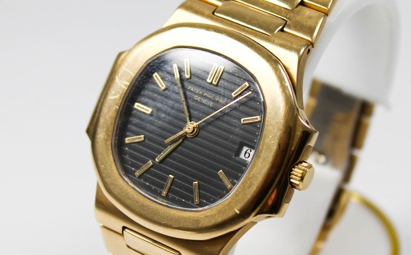Patek Philippe Geneve Armbanduhr in Gold mit Schwarzem Zifferblatt